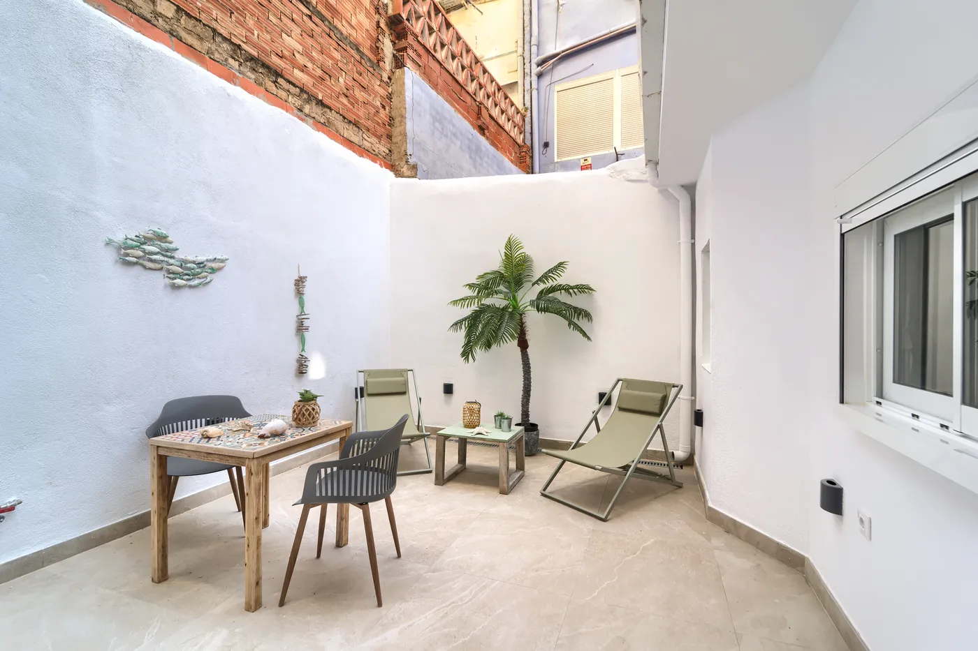 Patio reformado de una vivienda vendida